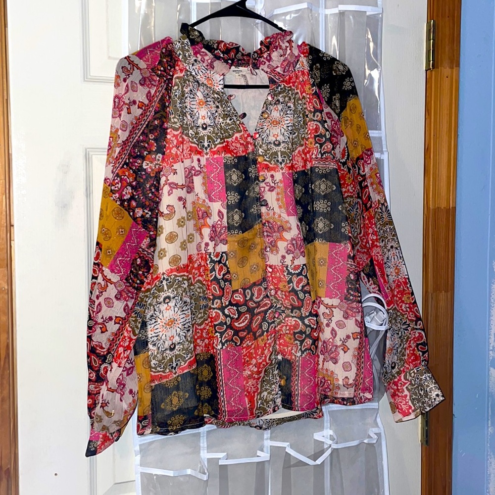 Multi color button up blouse. Light, long sleeved.